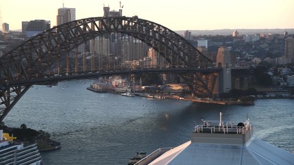 Aerial view of Sydney Harbor area at sunset from city rooftop