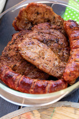 Unhealthy but tasty grilled sausages and meat