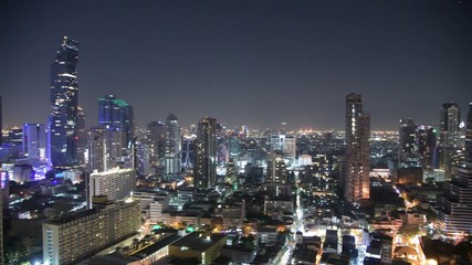 Amazing aerial view of Bangkok at night from city rooftop