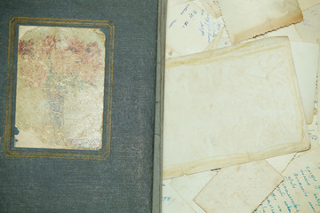 Background consisting of old, yellowed photographs.
