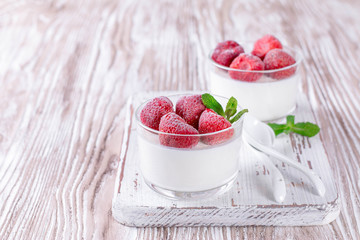 Panna cotta with frozen strawberries