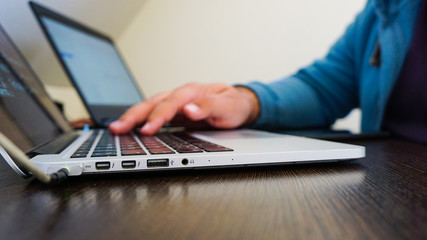 man working on laptop