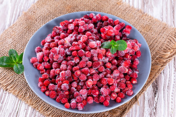 Frozen red wild strawberries