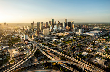 Naklejka na ściany i meble Houston city, aerial shot at sunset