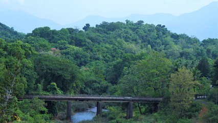LONG RIVER CROSSING BRIDGE IN BEAUTIFUL LANDSCAPE