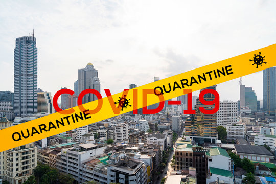 Quarantine sign over Bangkok cityscape day time. Modern skyscrapers panorama. COVID-19 self isolation concept.