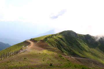 mountain top landscape. mountains in the clouds