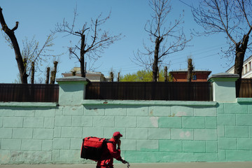 
Food delivery man on a deserted street