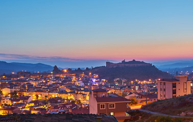 Fototapeta na wymiar View of Selcuk with Ayasuluk fortress during sunset in the evening