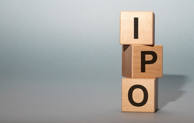 Text IPO on wood cube block, stock investment concept. Copy space