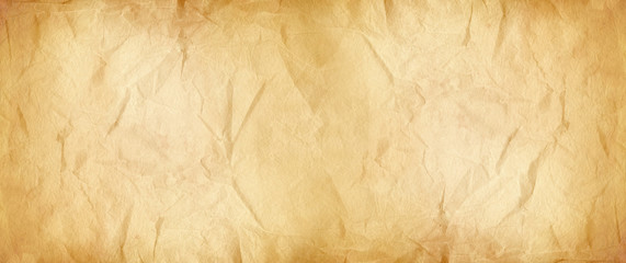 Old brown crumpled paper texture. Banner background