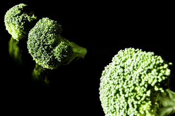Selective approach to a row of broccoli