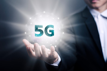 5G network, Asian male businessmen with the fastest new contract network effect in the new era, high-speed mobile Internet, new generation networks. Mixed media.
