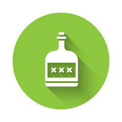 White Alcohol drink Rum bottle icon isolated with long shadow. Green circle button. Vector Illustration