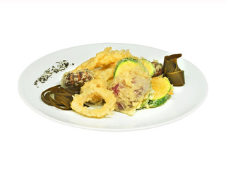 Rings squid with zucchinis and other vegetables