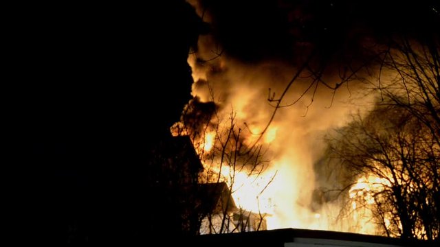 Big Fire of Two Houses Burning During the Night. Huge Flames.