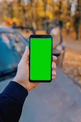 Smartphone in the driver 's hand