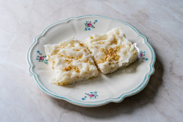 Traditional Turkish Ramadan Dessert Gullac . It is made with gullac (rice wafer or rice paper sheets) , milk, rose water, walnut, vanilla.