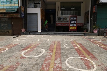 3 may 2020,sirsa\haryana\india.ockdown in India.only a single woman stand in front of a bank during nationwide lockdown