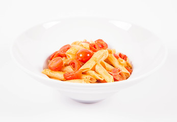 Penne with tomatoes, garlic and mozzarella on a white background