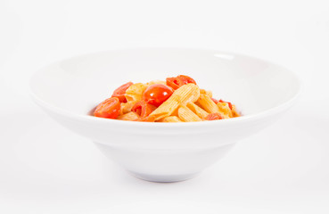 Penne with tomatoes, garlic and mozzarella on a white background