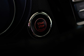 Detail on the start button in a car