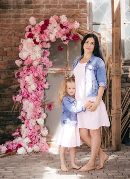 Stock Photo - Portrait of cute attractive mother and daughter, family with one single parent, warm hugs