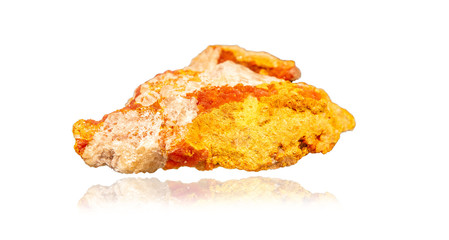 Red mineral orpiment on a white background