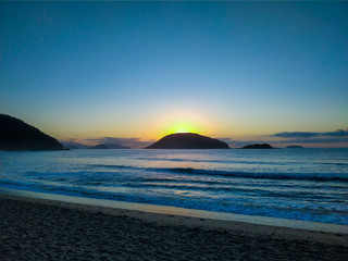 Fototapeta premium Beach at dawn.sunset, sea, beach, sky, water, ocean, landscape, sunrise, sun, nature, coast, island, waves, blue, clouds, dusk, horizon, wave, sand, cloud, lake, travel, dawn, mountain, evening