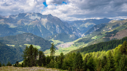 Fototapeta na wymiar Mountains surrounding the Austrian village Nauders. Both Italy (the Italian region Alto Adige is connected by the Resia Pass) and Switzerland (the canton of Graubünden) are close