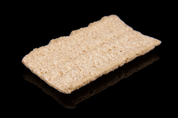 Flatbread grain cake isolated on the black