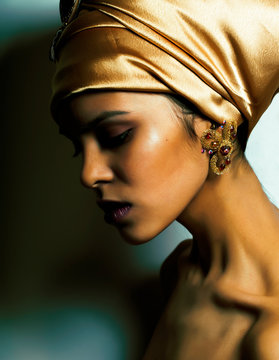 Beauty African Woman In Shawl On Head, Very Elegant Look With Gold Jewelry Close Up Makeup Macro