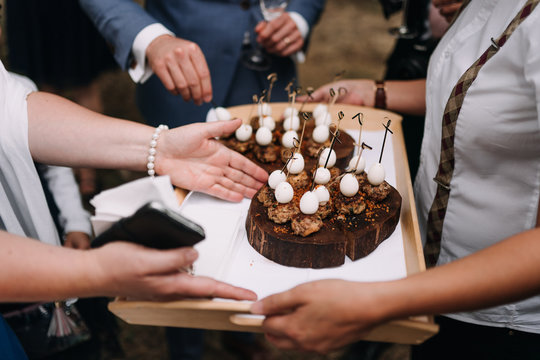 photo of cake serving in a party