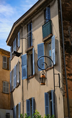 Fototapeta na wymiar Retro lantern on wall of old building, Antibes, France