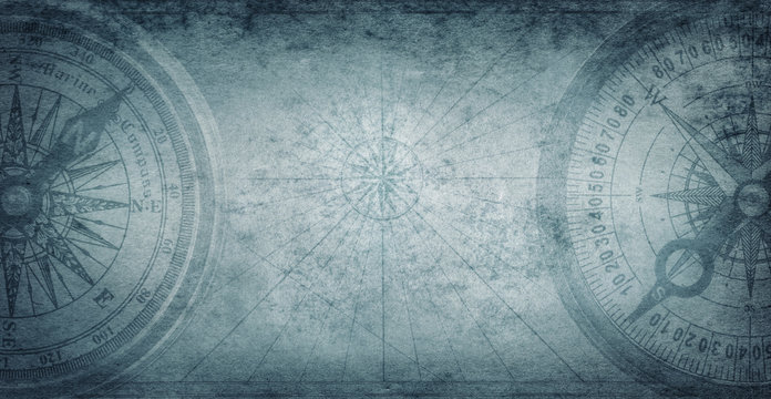 Ancient old compass on the vintage map background. Adventure, discovery, navigation, geography, education, pirate and travel theme concept background. History and geography team. Retro stale.
