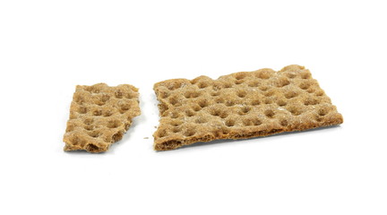 Crispy rye bread on white. Low calories snack bread isolated on white background.