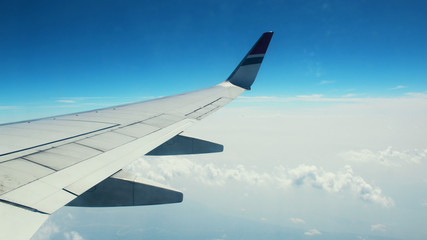 Obraz premium The Blue sky from the window of a plane. 