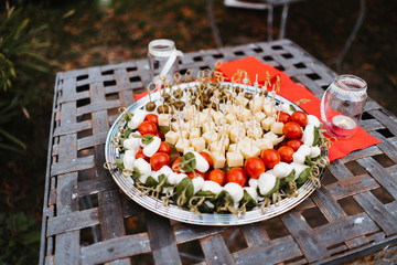 photo of small cheese and olive appetizers