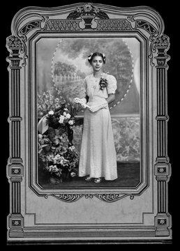 Antique Photo in Vintage Frame of a young woman's graduation picture in black and white.