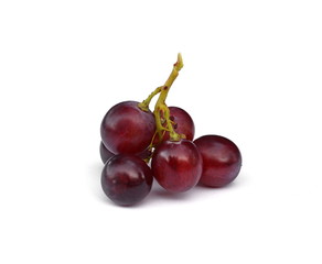 A bunch of overripe grapes isolated on white background.