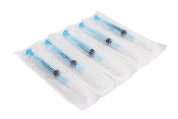 Medical Syringes in pack on white
