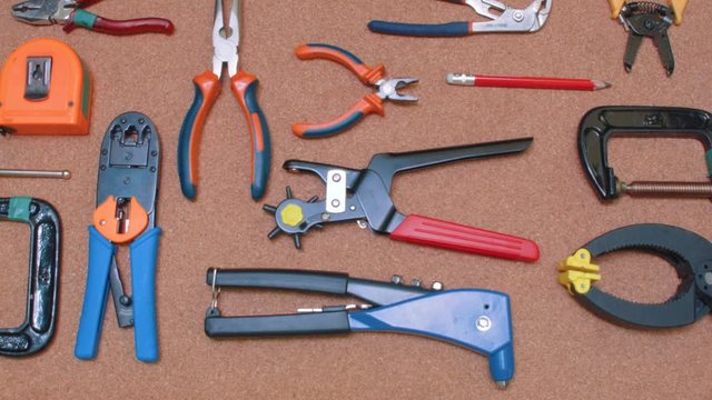 Set of tools being removed from a cork surface