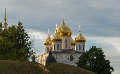Fototapeta na wymiar Domes Assumption Cathedral on Historical Square in summer above earthen rampart on Historical Square in summer, Dmitrov, Moscow Region, Russia, Dmitrov, Moscow Region, Russia