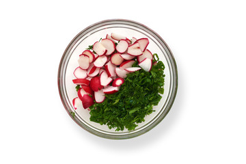 salad of radishes, green onions, dill and parsley, flat layout on a white background. healthy eating concept