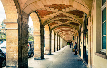 archway in the old town of Place des Vosges