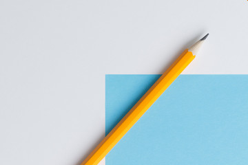 An interactive photo composition of an orange pencil and space for creative thinking (text) is used for presentation in the field of education, business or creativity.