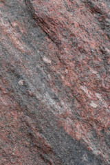 pattern and texture of natural untreated granite layers. stone surface for background