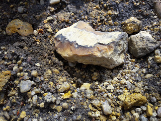 Titanium ore in the form of small small pieces with admixtures of silicon fragments. Loading from...