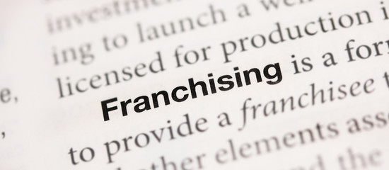 The word Franchising written in a book