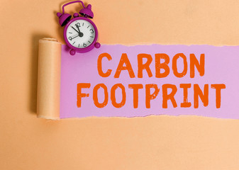 Handwriting text writing Carbon Footprint. Conceptual photo amount of dioxide released atmosphere...